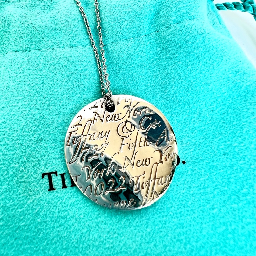 Tiffany & Co. Silver Note Script Wave Circle Round Pendant Necklace